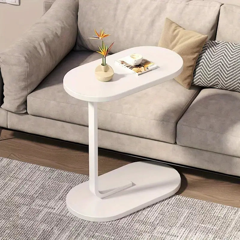 Pairing practicality with style, this C-shaped end table is a must-have