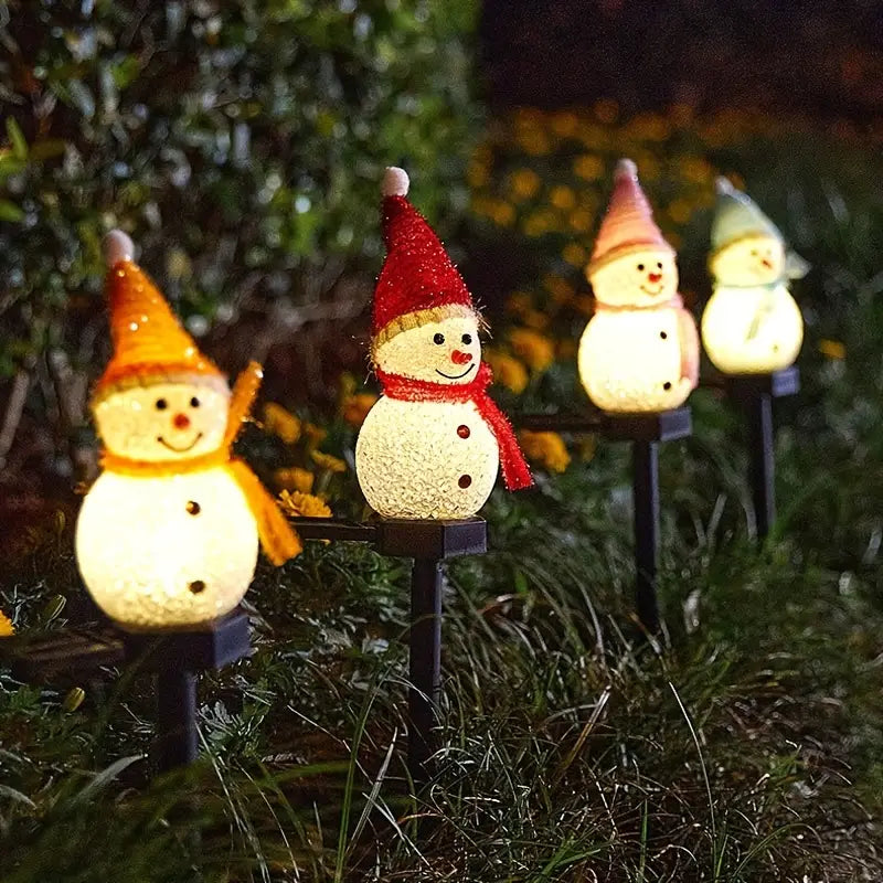 Radiant Solar Snowman Quartet: Festive Ground Plug-in Lights