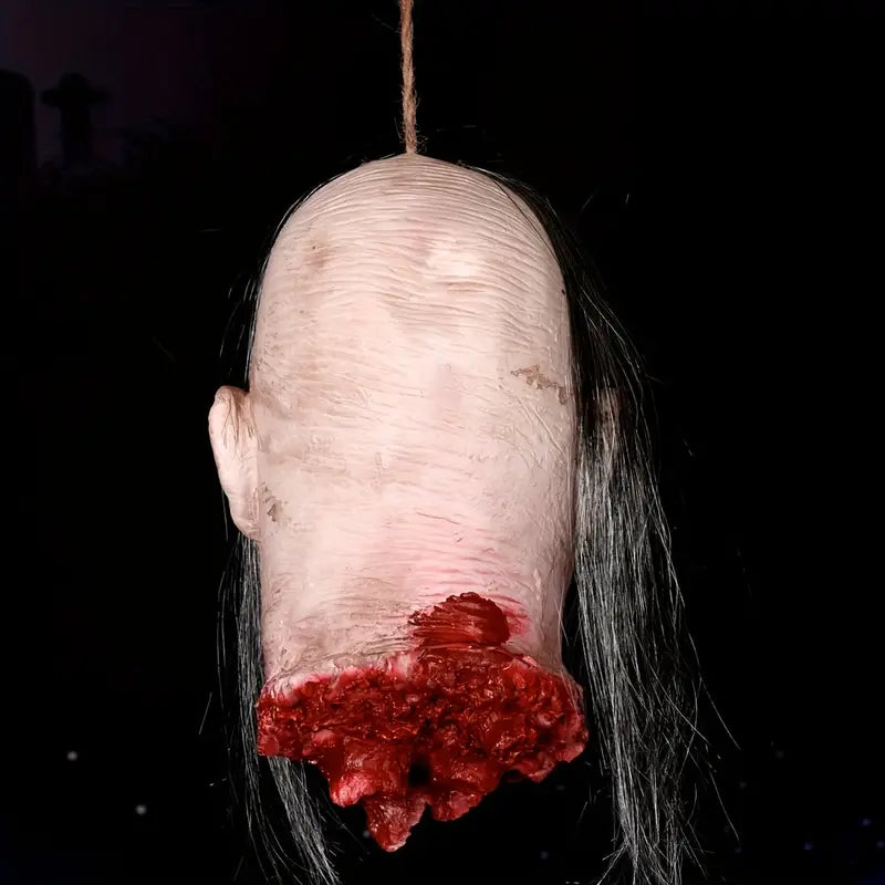 Crimson Haunting: The Ghostly Fake Man Head