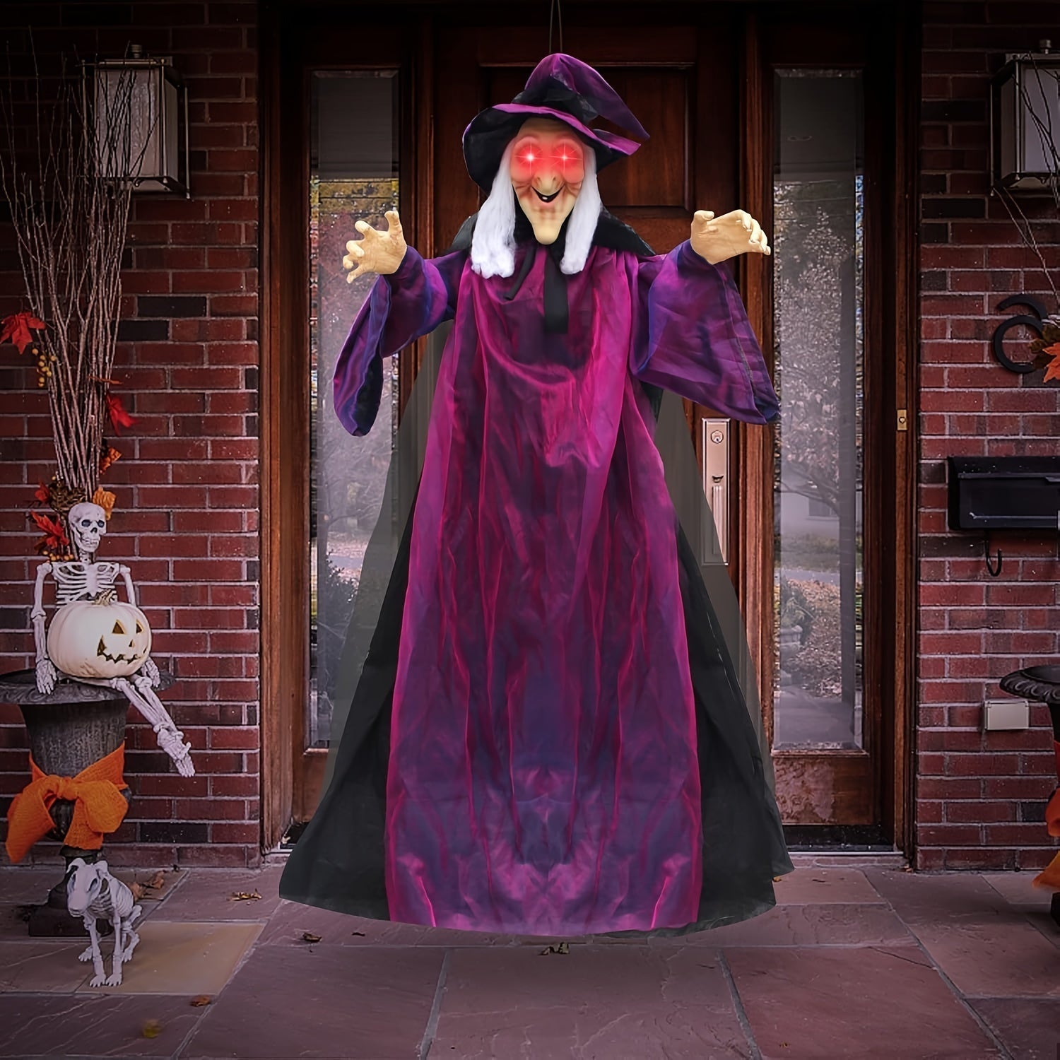 Animated Hanging Witch with Light-Up Eyes