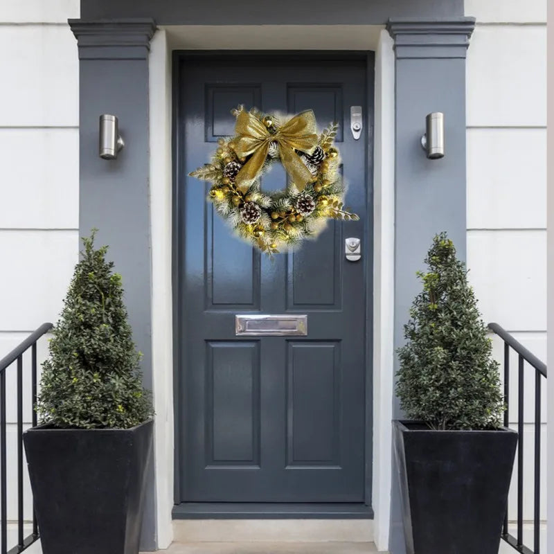 Golden Christmas Wreath With Pine Cones And Bow