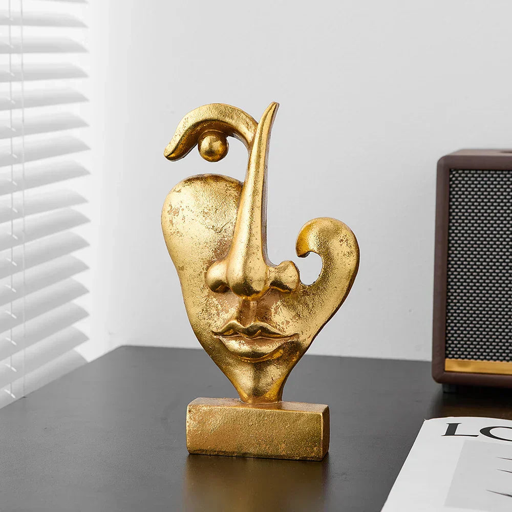 Sculpted Splendor: Elevate Your Space with Golden Face Art