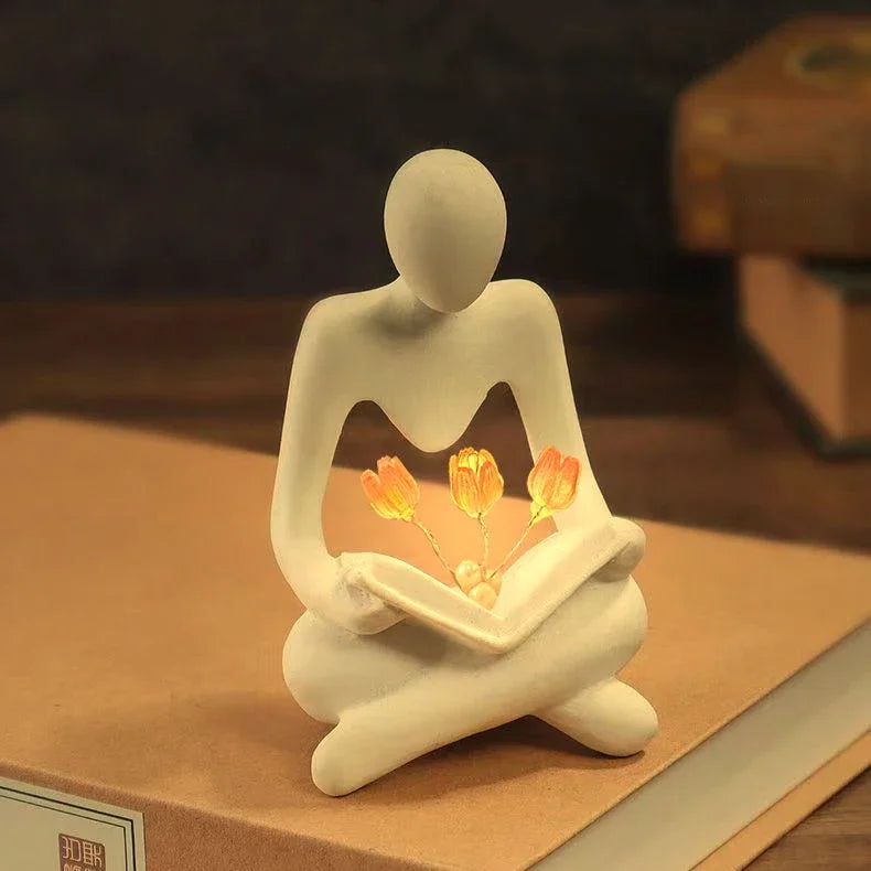 Elegance Illuminated: Abstract Figure Statue Lamp for Stylish Table Decor