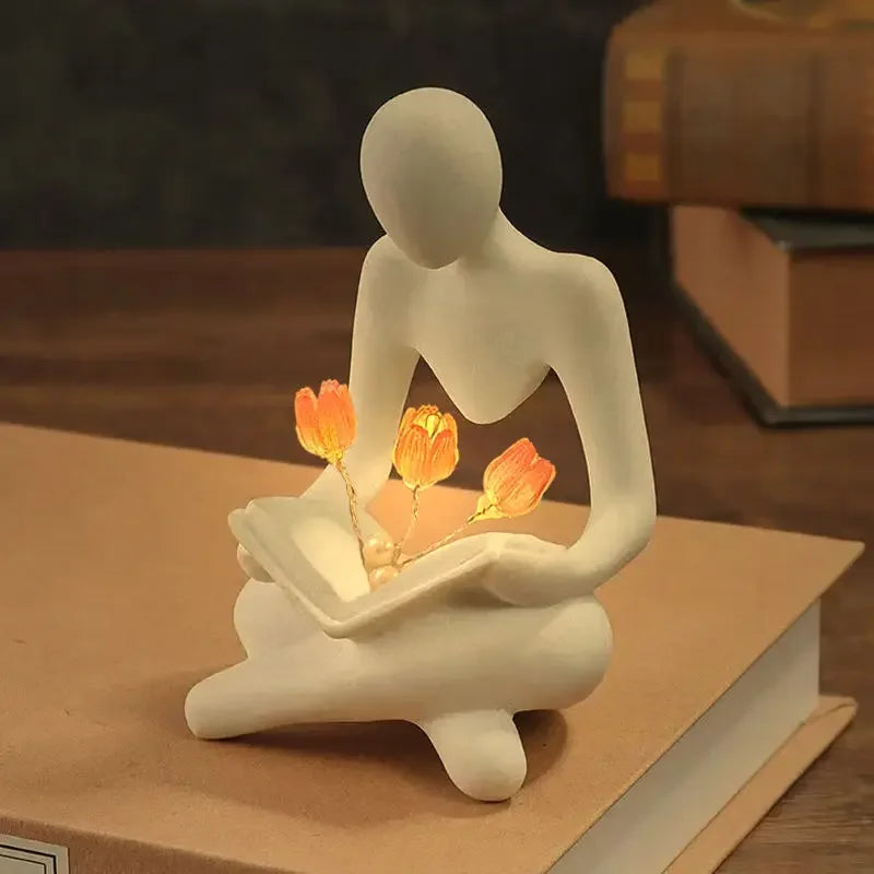 Elegance Illuminated: Abstract Figure Statue Lamp for Stylish Table Decor